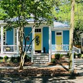 Blue and Yellow house - S Dearborn St at Church st - Church St East Historic district